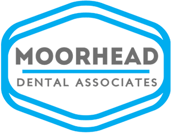 Moorhead Dental Associates logo featuring blue hexagonal badge with gray text and blue underline.