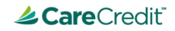 CareCredit logo featuring green curved design and teal text for dental payment financing.